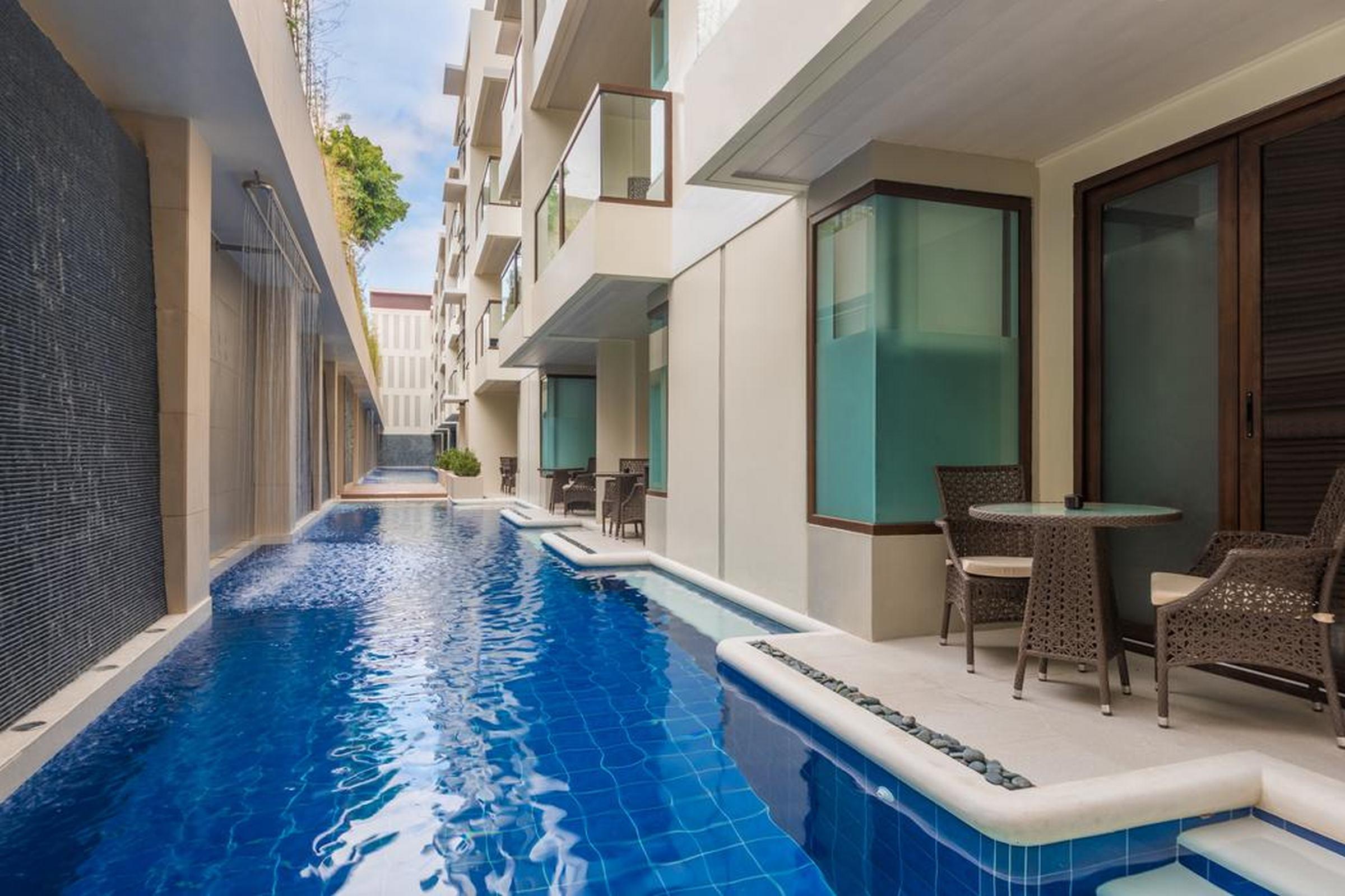 Henann Prime Beach Resort Balabag  Extérieur photo Swim-up rooms at the Hard Rock Hotel